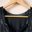 Mini vestido negro con espalda abierta y cintura alta con lentejuelas - EBEPEX